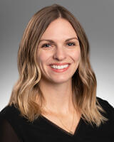 Laura Peschong smiling for professional headshot