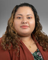 Yuri Guzman smiling for professional headshot