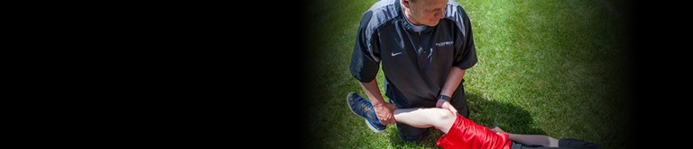 examining an injured player