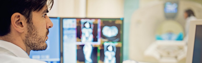 Doctor looking at patient scans