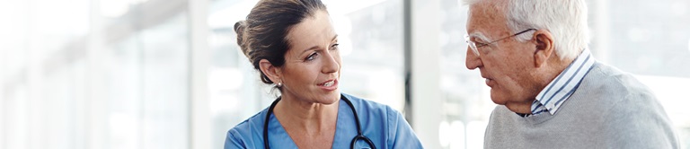 Doctor speaking with patient