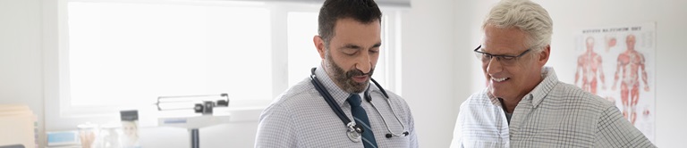 doctor talking with a male patient