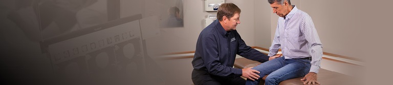 examining a mans leg