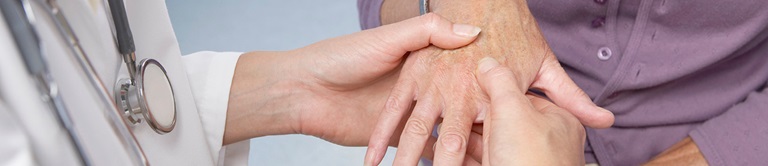examining a womans hand