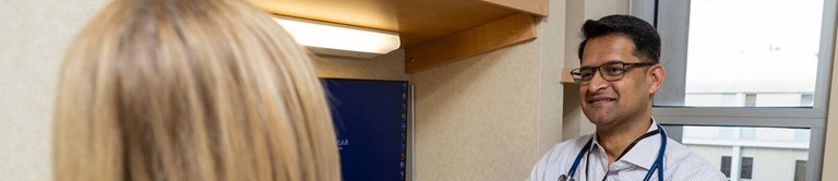 Doctor speaking with patient