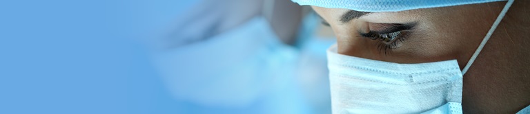 surgeon with face mask close up