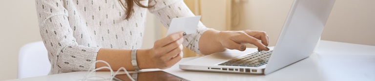 woman paying a bill online