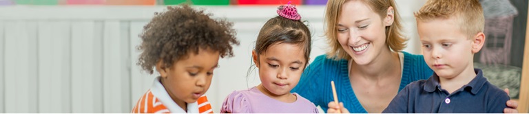 teacher working with small children