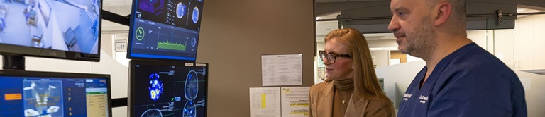 Doctors looking at computer screens